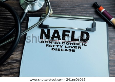 Concept of NAFLD - Non-Alcoholic Fatty Liver Disease write on paperwork isolated on wooden background. Royalty-Free Stock Photo #2416606065