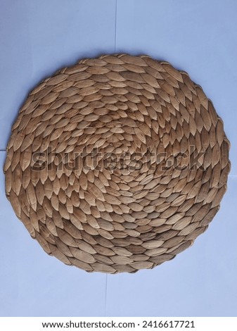 round woven handicrafts made from water hyacinth