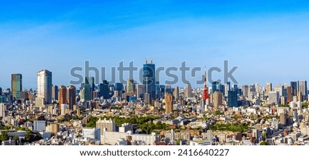 Tokyo central area city view with Tokyo Tower at daytime.