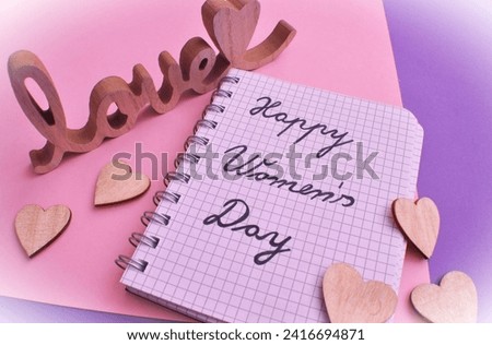 happy womans day write in notepad 