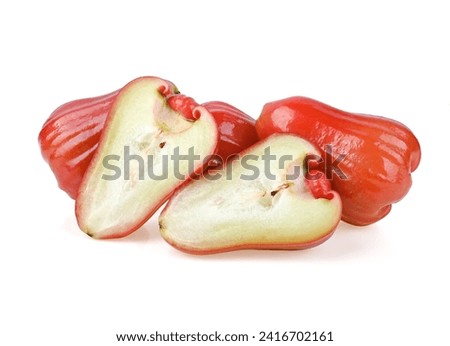 heap of Rose apple or chomphu thai fruit , half of of Rose apple  isolated on white background Royalty-Free Stock Photo #2416702161