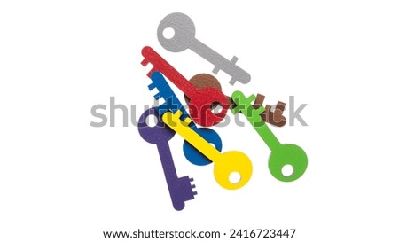 A colorful children's shape sorter toy with keys and locks, designed to engage young minds and enhance fine motor skills. High quality photo