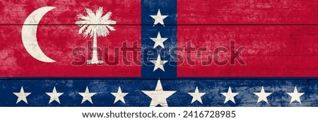 South Carolina State flag on a wooden surface. Banner of the grunge South Carolina State flag. 