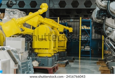 Industrial robot arm storage, product distribution Robot concept, Concept of artificial intelligence for the industrial revolution, and automation manufacturing process. 