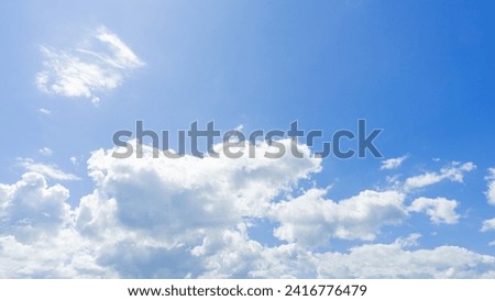 sky photography The sky is blue during the day, the weather is clear, the sun is bright, clear, there are large clouds, cumulus, fluffy white clouds, soft and fluffy like cotton. Overlapping each othe