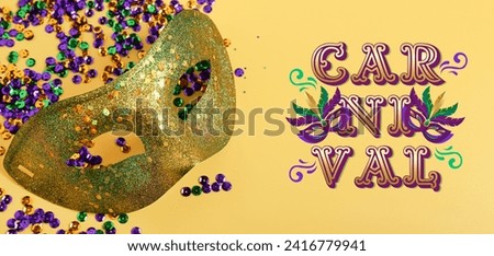 Mask with sequins and text CARNIVAL on yellow background