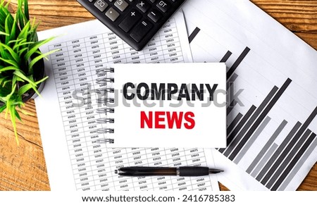 COMPANY NEWS text on notebook with chart and calculator
