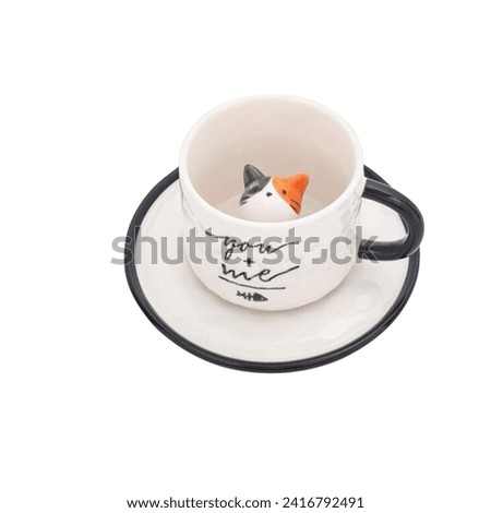 Ceramic mug with cat decoration in the glass