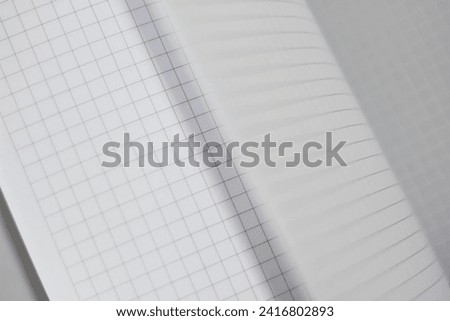 Turn Pages of Checkered Paper Notebook. Pattern Paper Abstract Background.