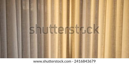 "Radiant and welcoming, this sunlit house curtain creates a warm and inviting atmosphere. Purchase this image and illuminate your projects with luminosity and comfort!" Royalty-Free Stock Photo #2416843679