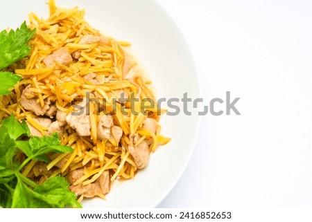 Stir-fried Chicken with Ginger served on a white plate.
