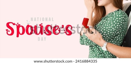 Banner for National Spouses Day with young man proposing to his beloved Royalty-Free Stock Photo #2416884335