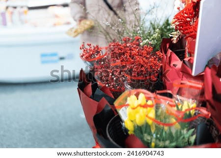 Asian Lunar New Year, Chinese red, red bouquet, festive home floral art, Spring Festival business district, Year of the Dragon decoration，High-end flower materials, exquisite flowers,SHOTLISTtravel