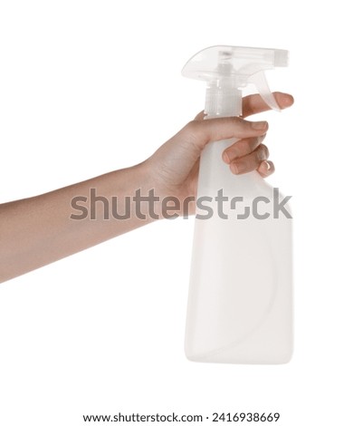 Woman holding plastic spray bottle with liquid isolated on white, closeup