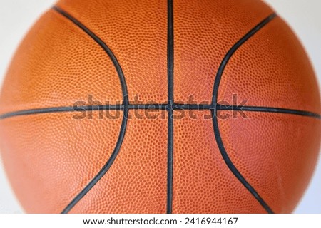 A basketball ball close-up on a white background. Sports background