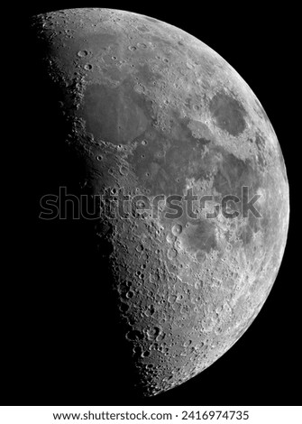 First quarter of the Moon pictured throught an amateur telescope (SCT 250 mm)
