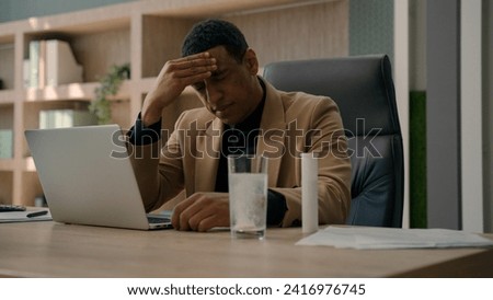 African American overworked businessman throw fizzy pill in glass of water apply drug supplement dissolving painkiller tablet with bubbles suffer headache sick man prepare remedy drink on office table