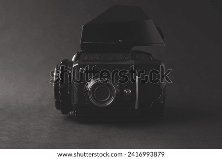 Professional medium format camera on black background