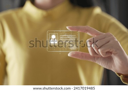 human hand holding digital identification card, technology and innovation concept. hand and digital identification card or digital ID.	 Royalty-Free Stock Photo #2417019485