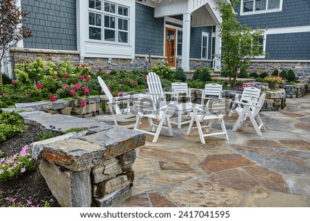 Elegant Patio Furniture and Landscaped Garden of Modern Home