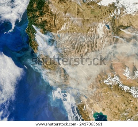 A Smoky Inferno. Intense fires raged in several western states over the Labor Day weekend. Elements of this image furnished by NASA.