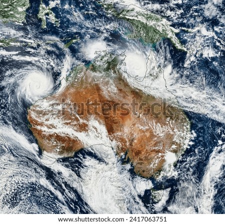 Northern Australia Braces for a Pair of Cyclones. Evacuations have been made in Northern Territory as residents brace for fierce winds. Elements of this image furnished by NASA.