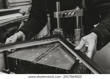 Man Joining a Picture Frame, Picture framing production