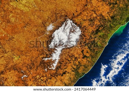 A Winter Blanket for Lesotho. Snowfall occurs periodically in the short winter season, though not as often as it once did. Elements of this image furnished by NASA.