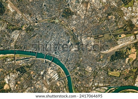 Cologne, Germany. The city is the cultural, historic, and economic capital of the Rhineland, a vital inland port, and the busiest rail junction. Elements of this image furnished by NASA.