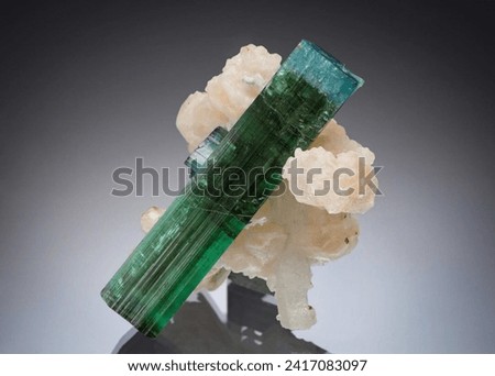 TOURMALINE MINERAL STONES, ROUGH GREEN GEMS Royalty-Free Stock Photo #2417083097