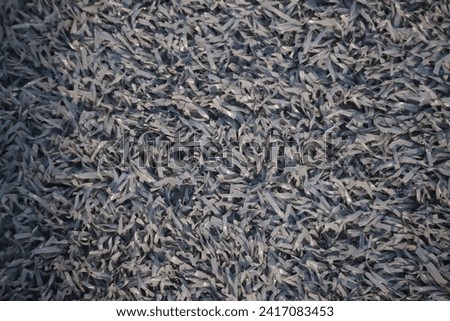 Close up picture of a turf football field