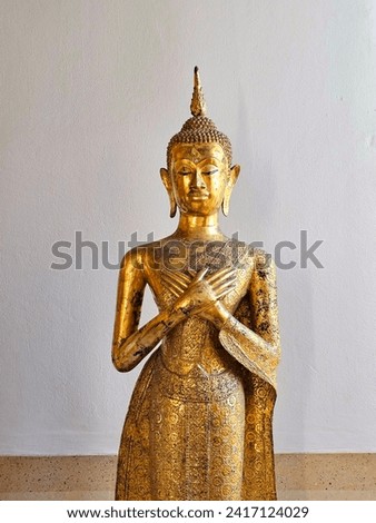 Golden ancient Buddha statue in the church:Use for website banner background,backdrop