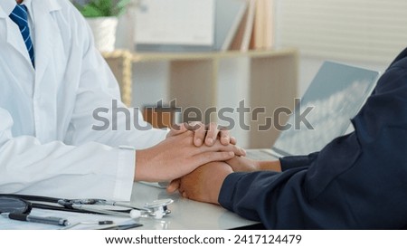 Health care concept.The doctor hold hands patient, giving empathy, comfort, psychological support, explaining serious diagnosis of illness.