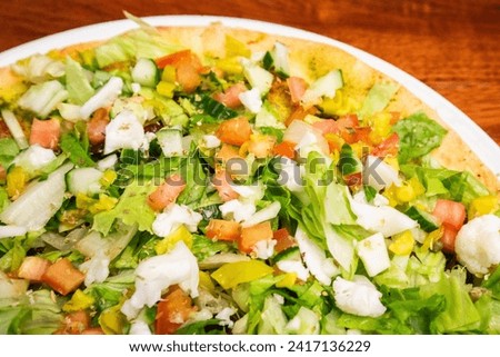 Green Salad Pizza at Table 