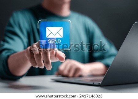 Marketing or newsletter concept, Businessman touching virtual Email icons for Send documents by email. Direct selling projects in business List of customers who want to send by email. Royalty-Free Stock Photo #2417146023