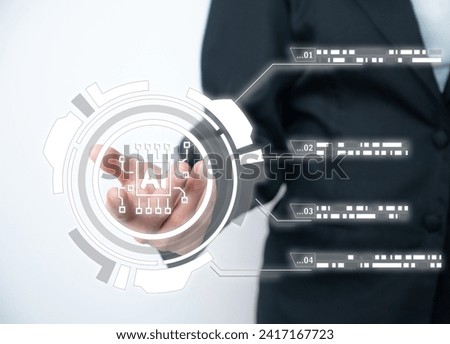 Business person showing hand with futuristic AI icon. Artificial intelligence has become a critical technology in today's world and how it's transforming the way we think and live.