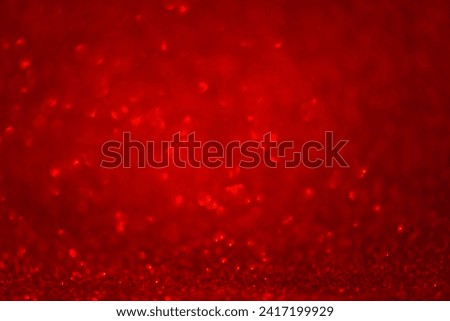 red background with highlights, sparkles. Beautiful holiday background, background for postcards, with copy space