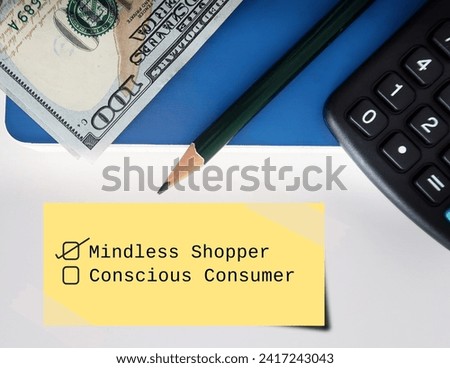 Money calculator pencil on notebook with note written ticking MINDLESS SHOPPER not CONSCIOUS CONSUMER - to overcome impulse buying and become a more conscious consumer Royalty-Free Stock Photo #2417243043