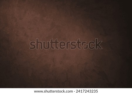 Chocolate Brown Venetian plaster Wall Background with spotlight. Beautiful Abstract Dark Decorative Stucco. Artistic Texture with Copy Space for design.