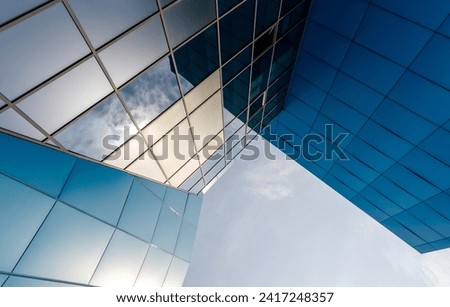 walls and windows of high business building bottom view architectural background pattern abstract
