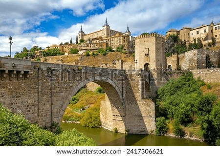 Cityscape of Toledo with the Alcantara bridge in the forefront, Toledo, Spain Royalty-Free Stock Photo #2417306621