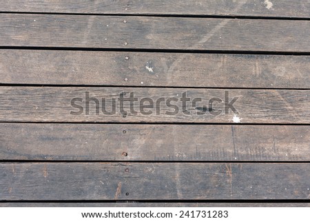 old and dry wood floor texture with rusty pin