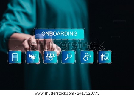 Onboarding business process concept. Businessman touch virtual onboarding icon for making sure new employees can hit the ground running with their new team.
