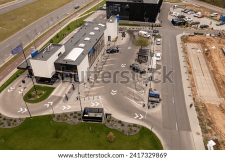 Drone photography of modern and new car wash during cloudy autumn day