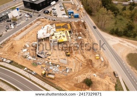 Drone photography of small construction site during autumn cloudy day