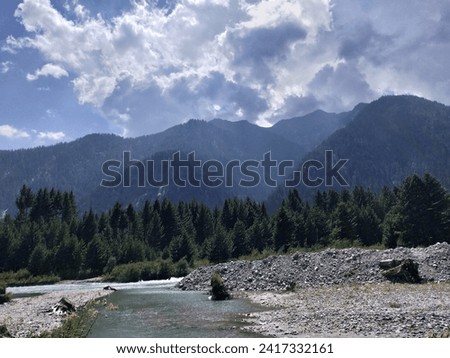Photo of the Majestic Kumrat Valley in the upper dir district of Khyber pukhtunkhwa province of Pakistan. Kumrat valley is a very popular tourist destinition with a vast forest and beautiful river.