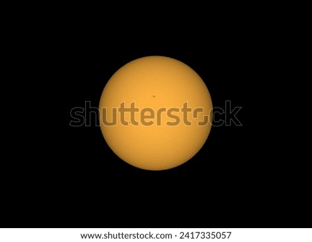 Transit of planet Mercury in front on the Sun on May 9, 16 at 13h38 UT pictured through an amateur telescope.