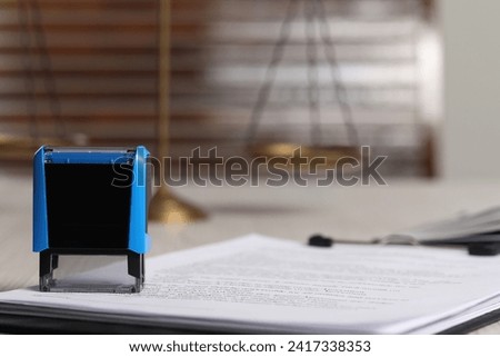 Notary contract. Documents and stamp on table, space for text