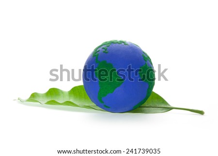  Earth on Green Leaf . Elements of this image furnished by NASA 