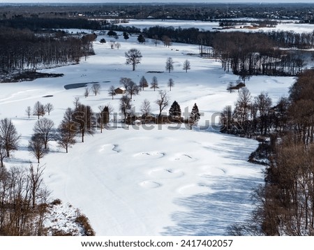 Golf course in the winter from an aerial view